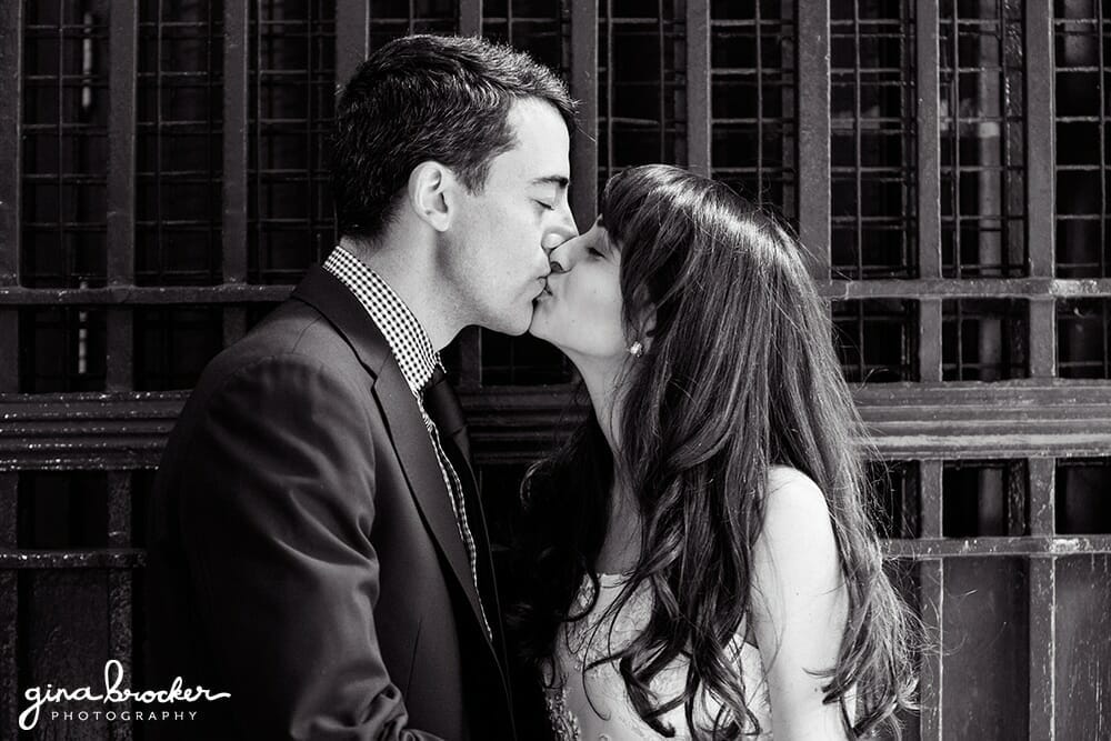 Bride and Groom kissing in the city