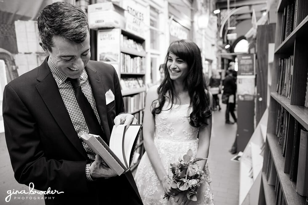 Bride and Groom laughing in book shop