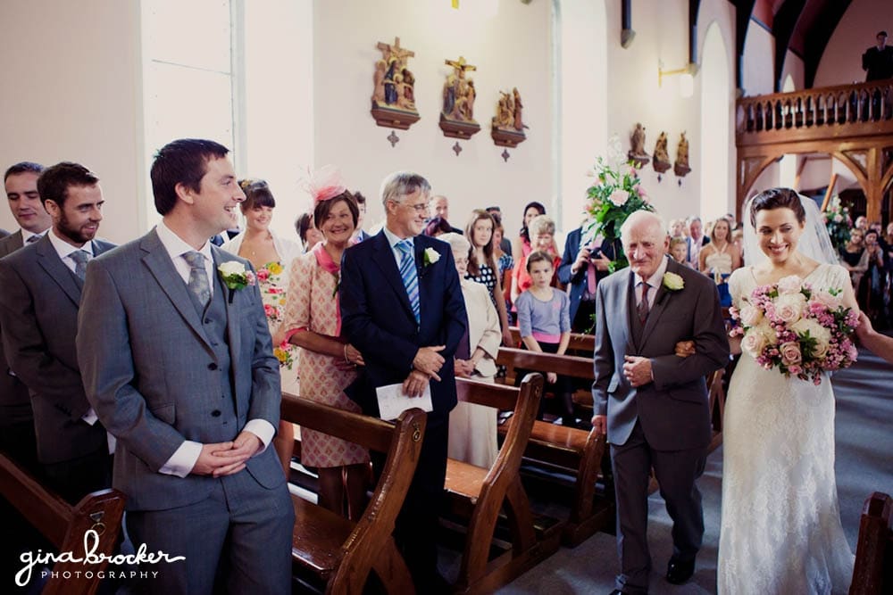 Bride walking up the aisle Groom waits for Bride to walk up the aisle