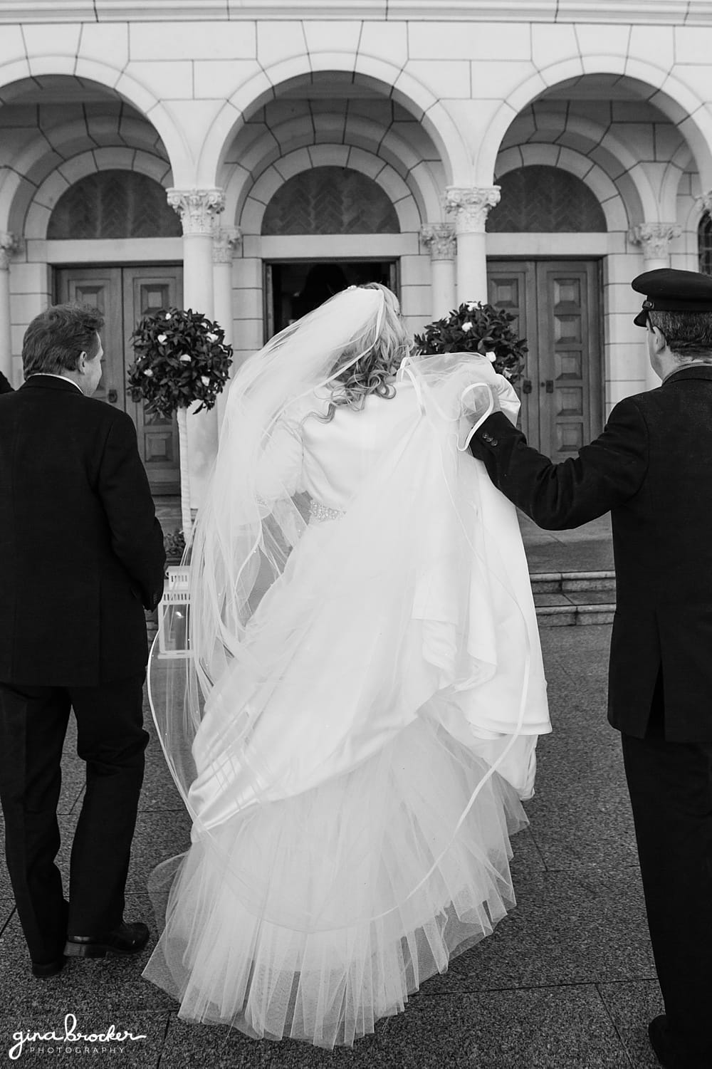 Bride walks into church with her father