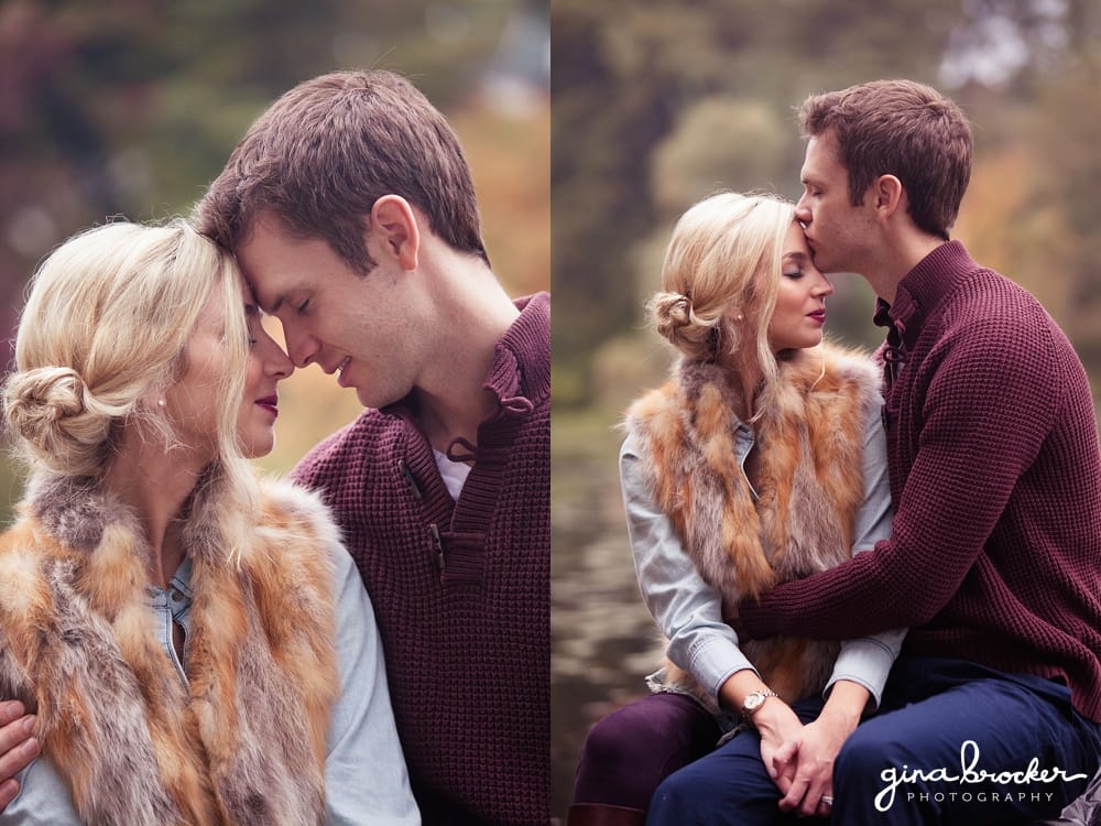 A couple share an intimate moment during their woodsy fall engagement session in newton massachusetts