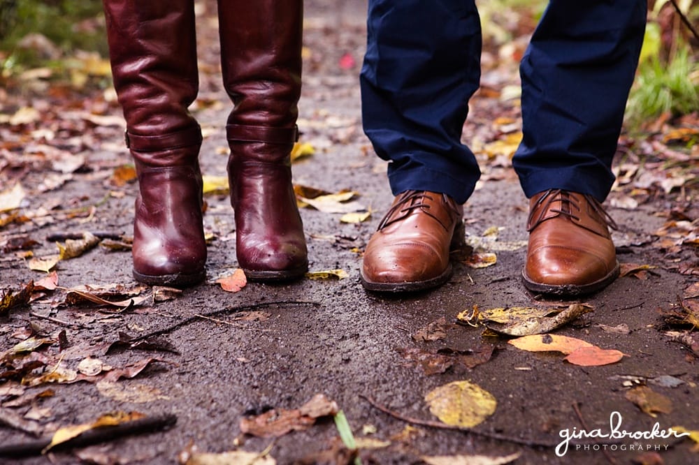 A detail of a couples shoes as the take a walk in the forest during their woodsy new england engagement session