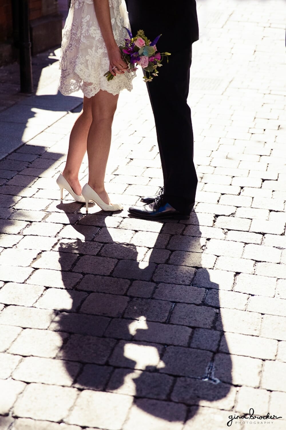 Bride and Groom Kiss in the Street Bride and Groom Kiss in the Street