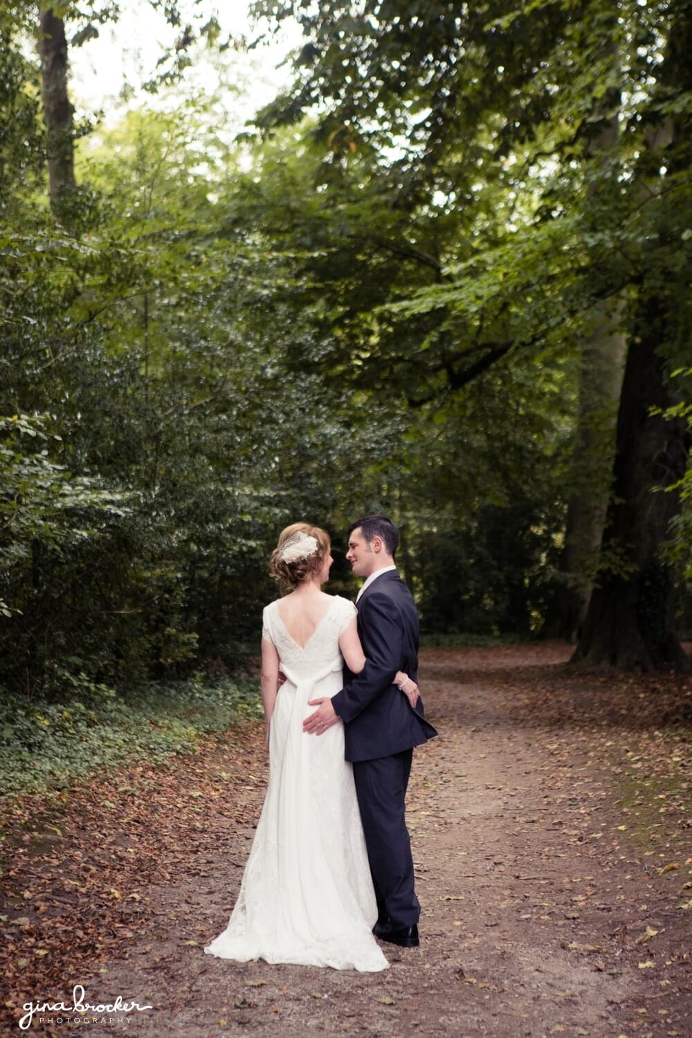 Bride and Groom walking in the woods