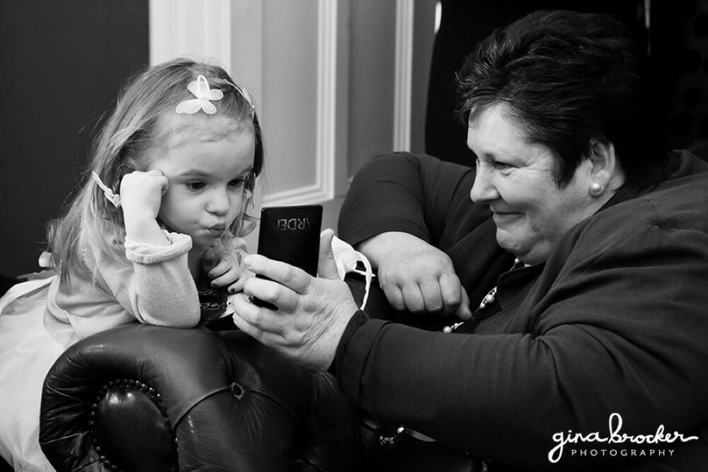 Flower Girl with lipstick Flower Girl looking in mirror with lipstick