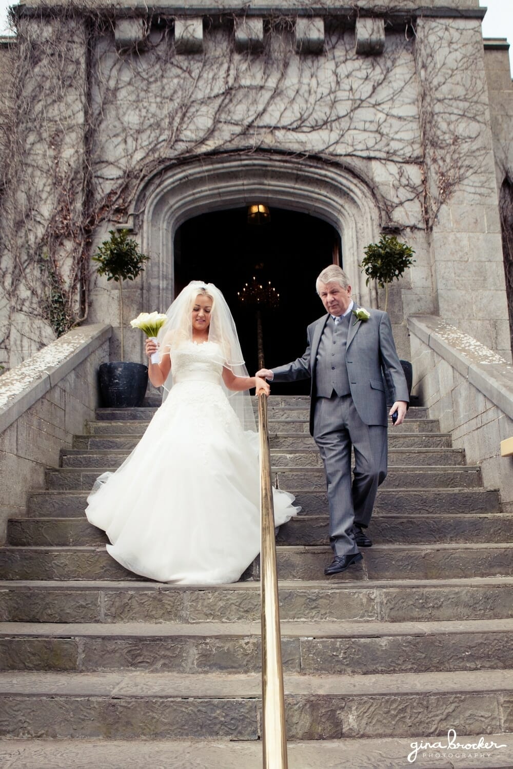 bride with father bride leaving for church with father