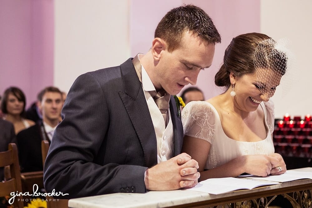 Bride and Groom Pray During Wedding Ceremony