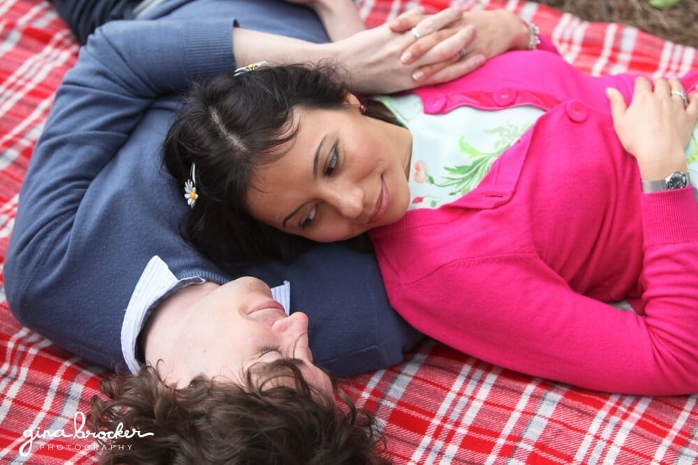 Relaxed and sweet portrait of a couple laying a blanket during a Boston love shoot