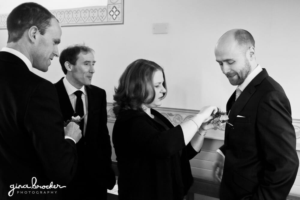 Groom putting on Boutonniere 12.Relaxed.Rustic.Wedding.Groom