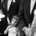 A flower girl yawns during a wedding ceremony in Boston, Massachusetts