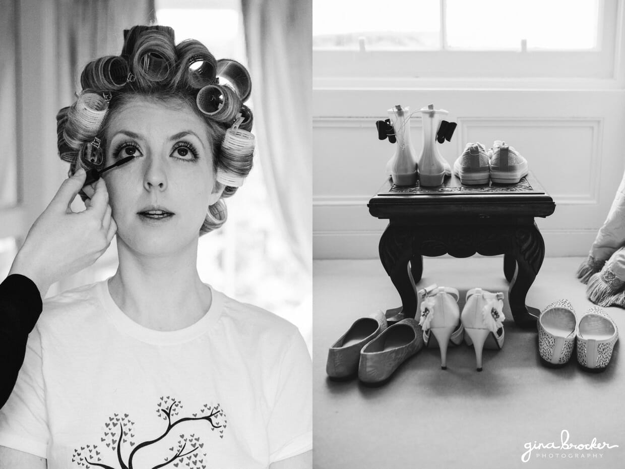 A cute photograph of a bride getting her makeup done with a collection of wedding shoes