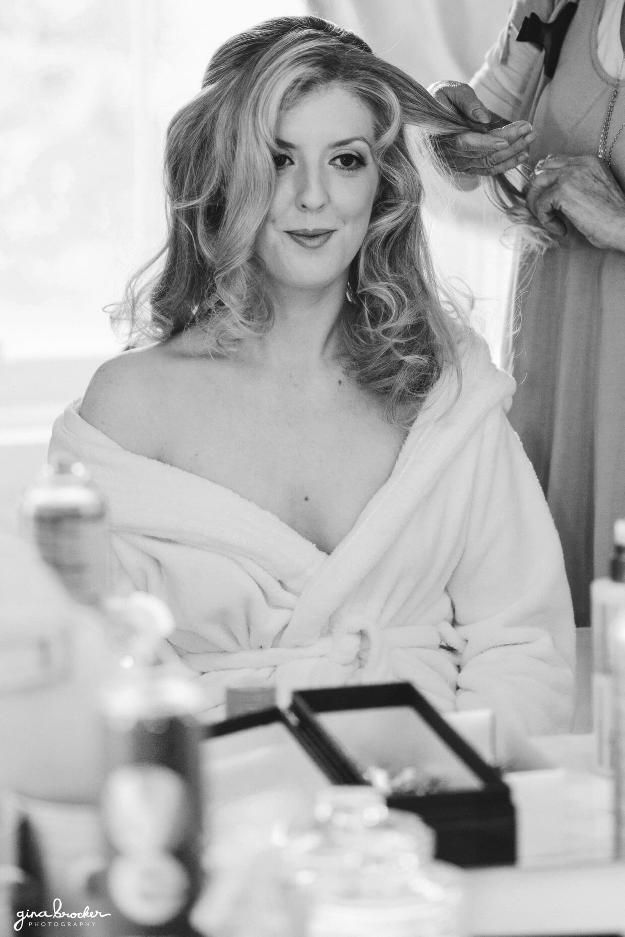 bride-getting-ready The bride gets a classic and vintage inspired hair style on the morning of her wedding