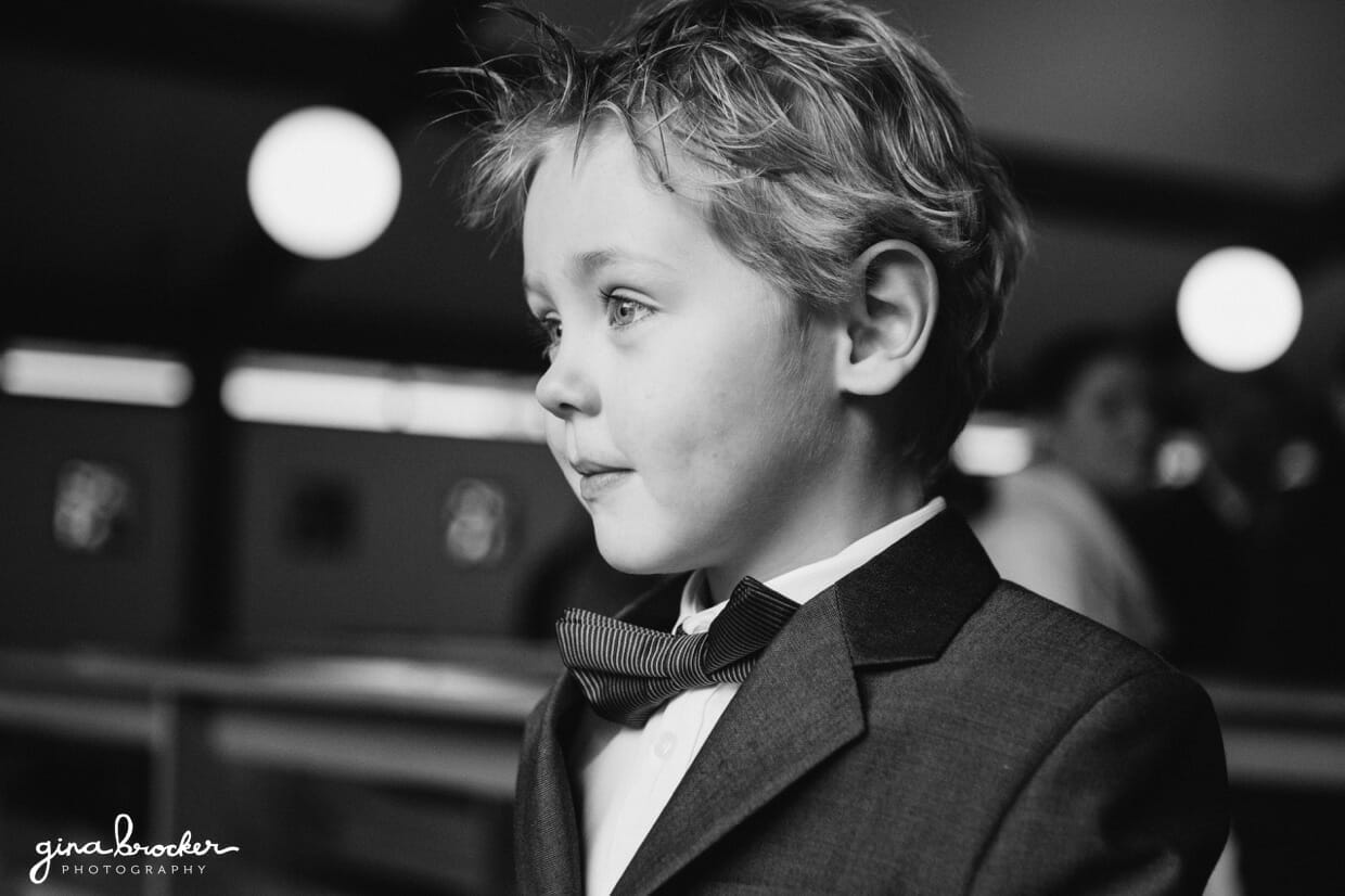 The ring bearer waits for the brides arrival to the church