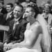 A fun photograph of a bride and groom laughing during their wedding ceremony in Boston, Massachusetts