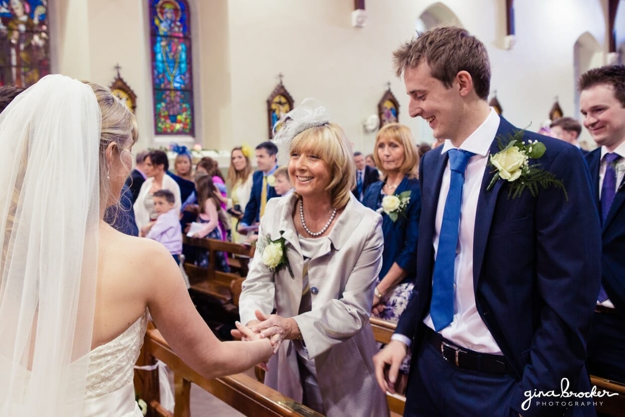 mother.congratulates.the.bride The mother of the bride shakes her daughter's hand after she is pronounced husband and wife