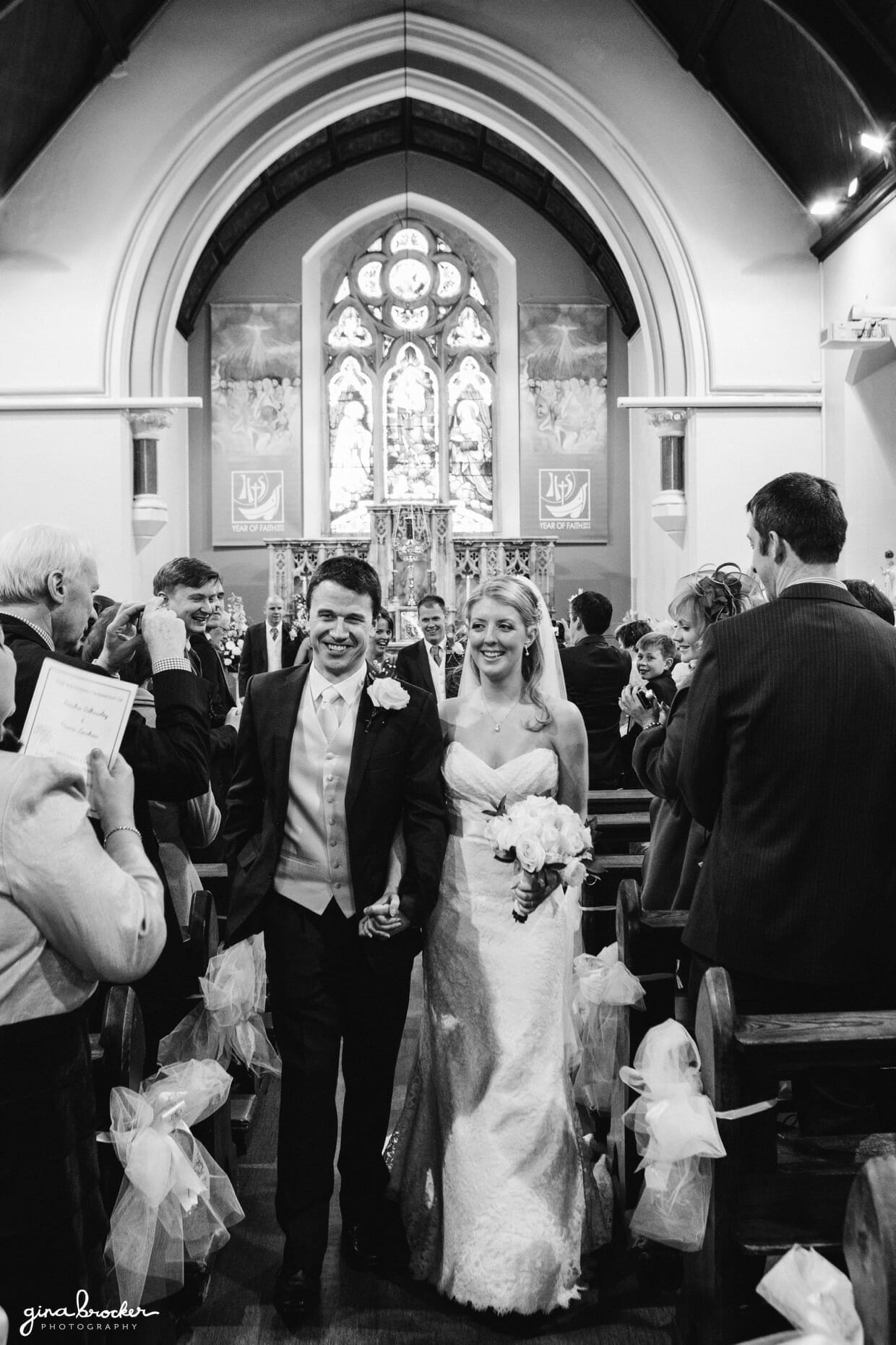 bride-and-groom-walk-down-the-aisle The bride and groom walk down the aisle as husband and wife