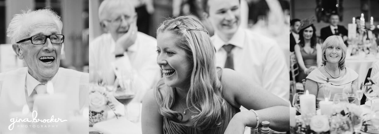 Guests-laughing-during-wedding-toasts Guest laugh at the hilarious wedding toast given by the best man