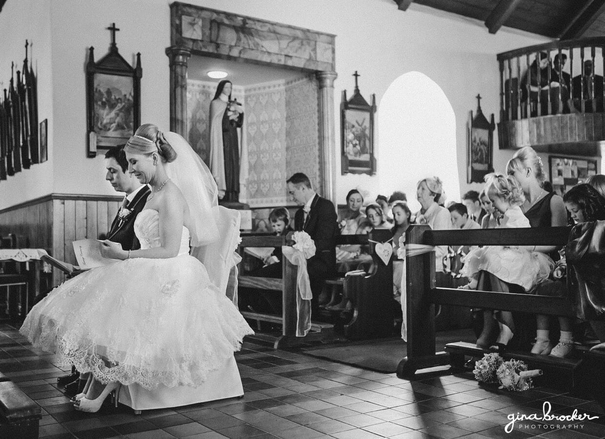 16.church.wedding.ceremony The bride and groom sit together during an intimate church wedding ceremony