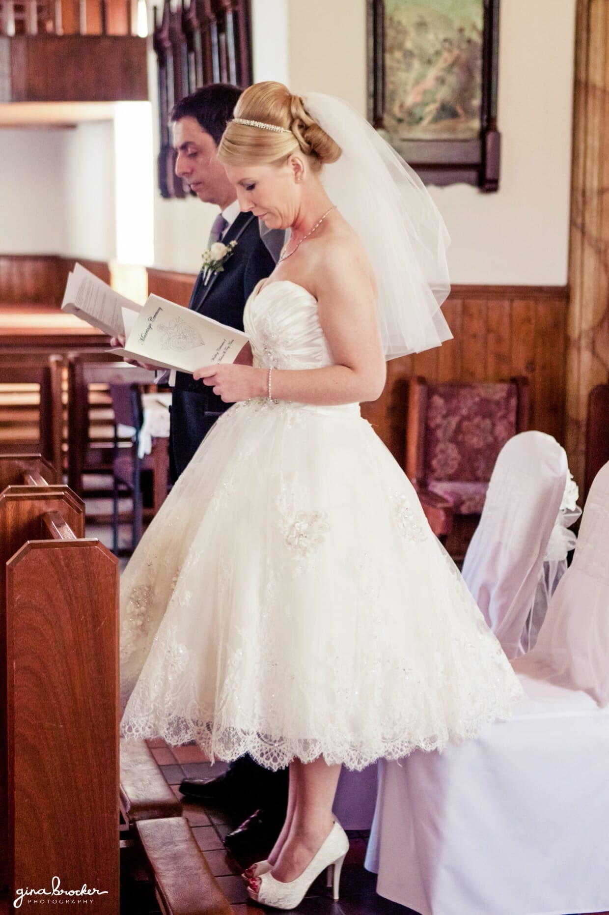 28.bride.and.groom.read.prayer The bride and groom read a prayer together during their intimate and sweet wedding ceremony