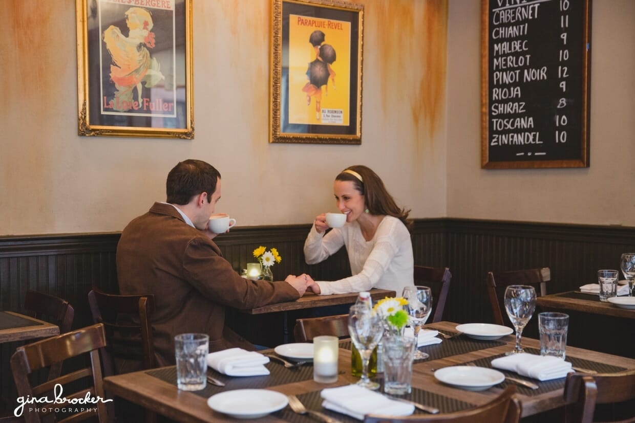 A couple drink coffee during their relaxed couple session in a Boston cafe, Panificio