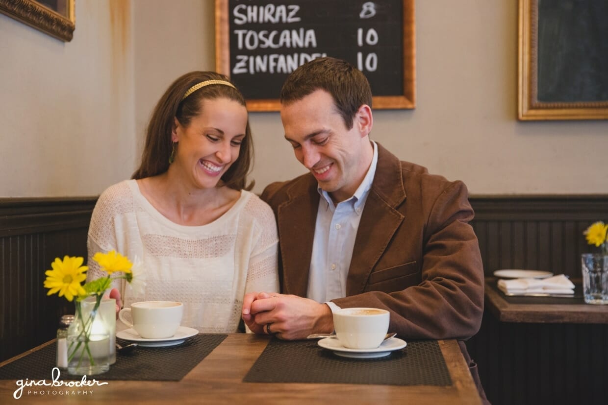 A sweet and natural photograph of a couple during their beacon hill couple session in a Boston cafe
