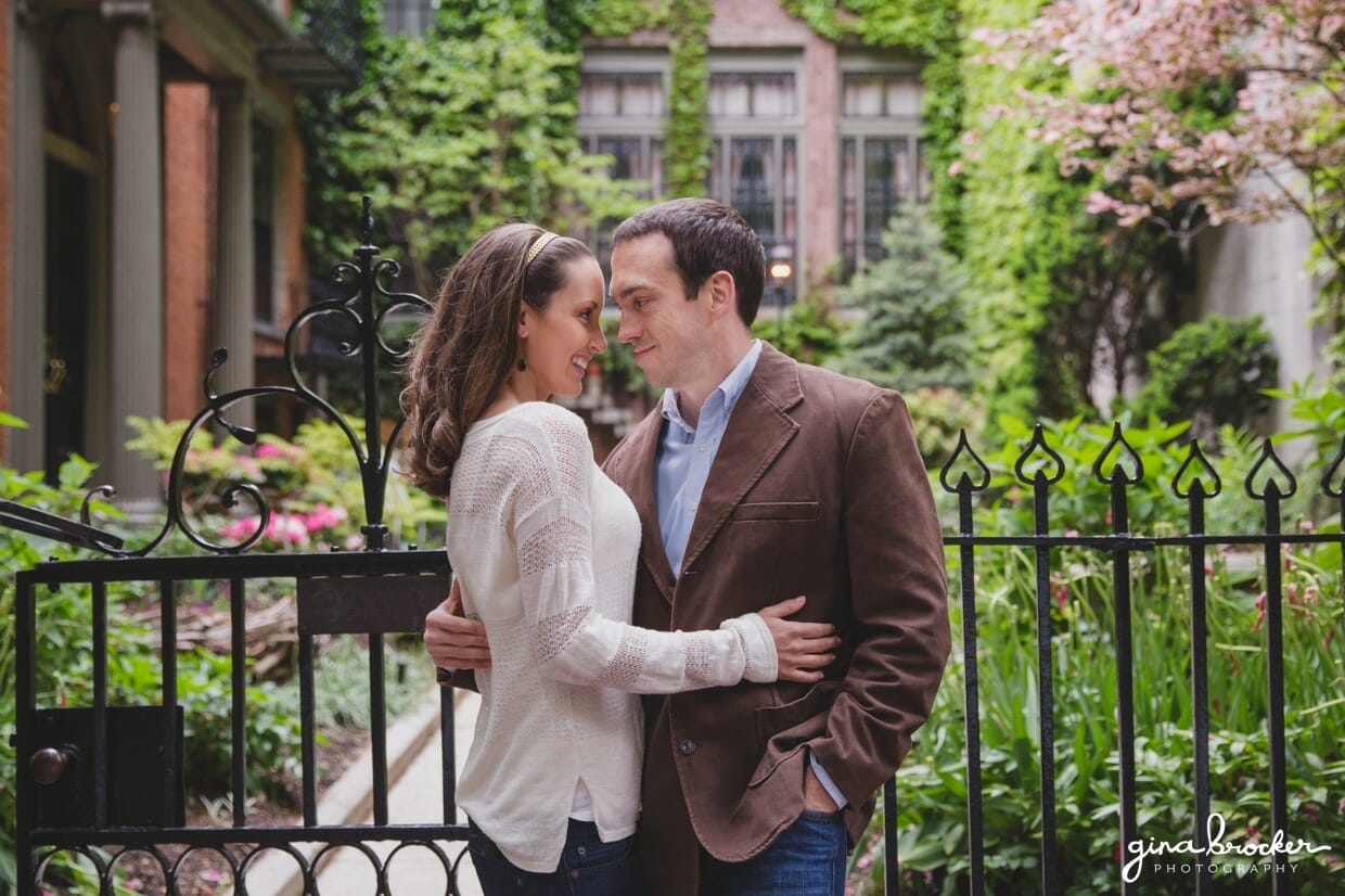 A couple share a sweet moment in the beautiful beacon hill during their boston engagement session