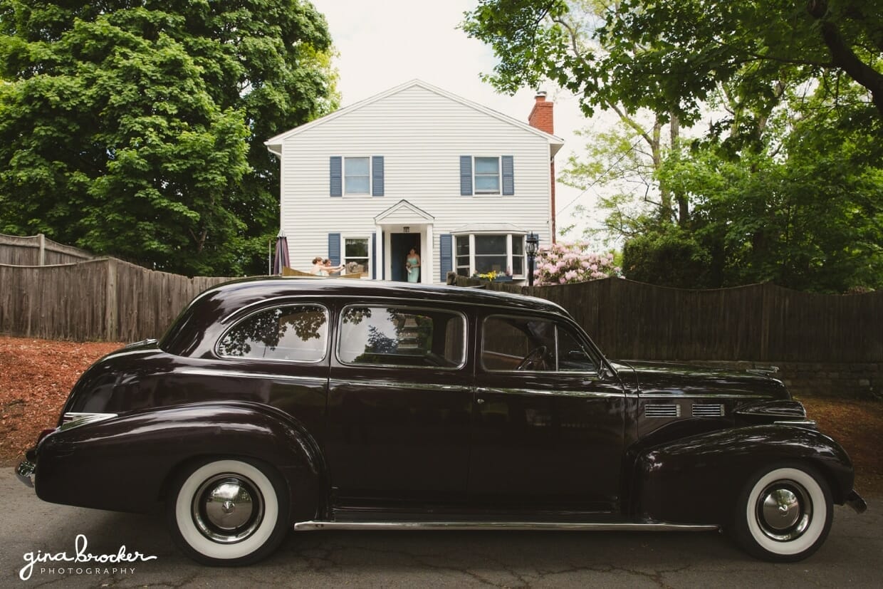 A wedding car waiting outside of the house on the morning of a wedding in salem, massachusetts