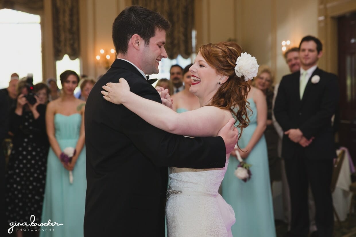 A fun and sweet photograph of a bride and grooms first dance at the Hawthorne Hotel in Salem, Massachusetts