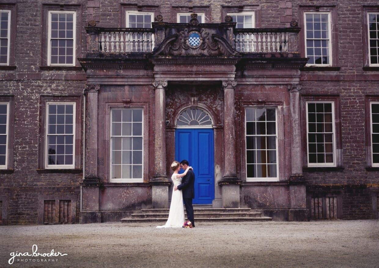 A bride and groom hug during their first look at a vintage inspired wedding in boston massachusetts
