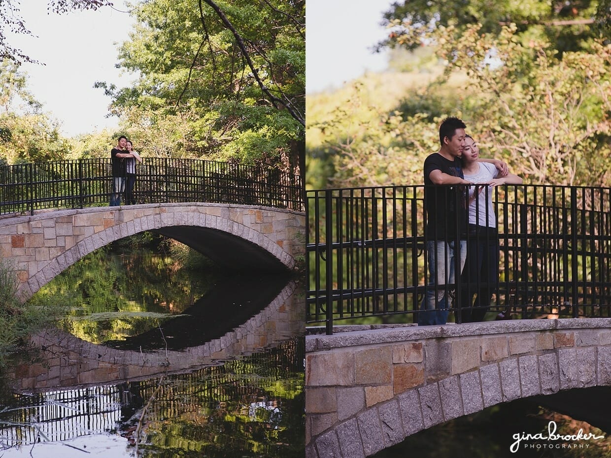 A couple cuddle together on a bridge in Back Bay Fens during their Boston Engagement Session