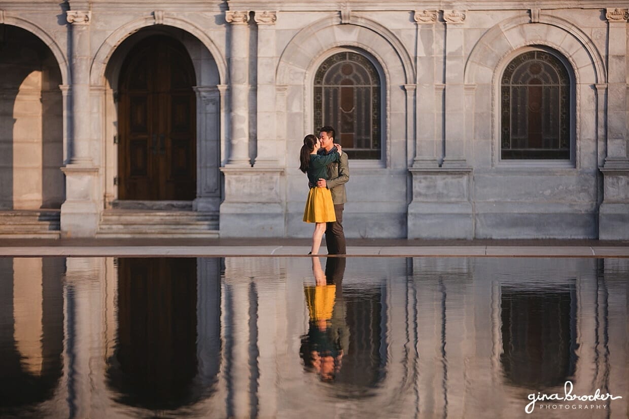A couple kiss during their romantic Christian Science Center Engagement 