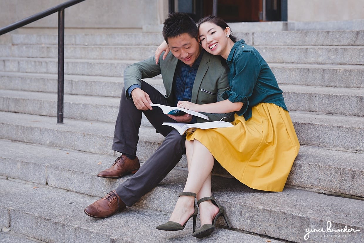 A cute photograph of couple on the steps of Northeastern University during their Boston Engagement Session