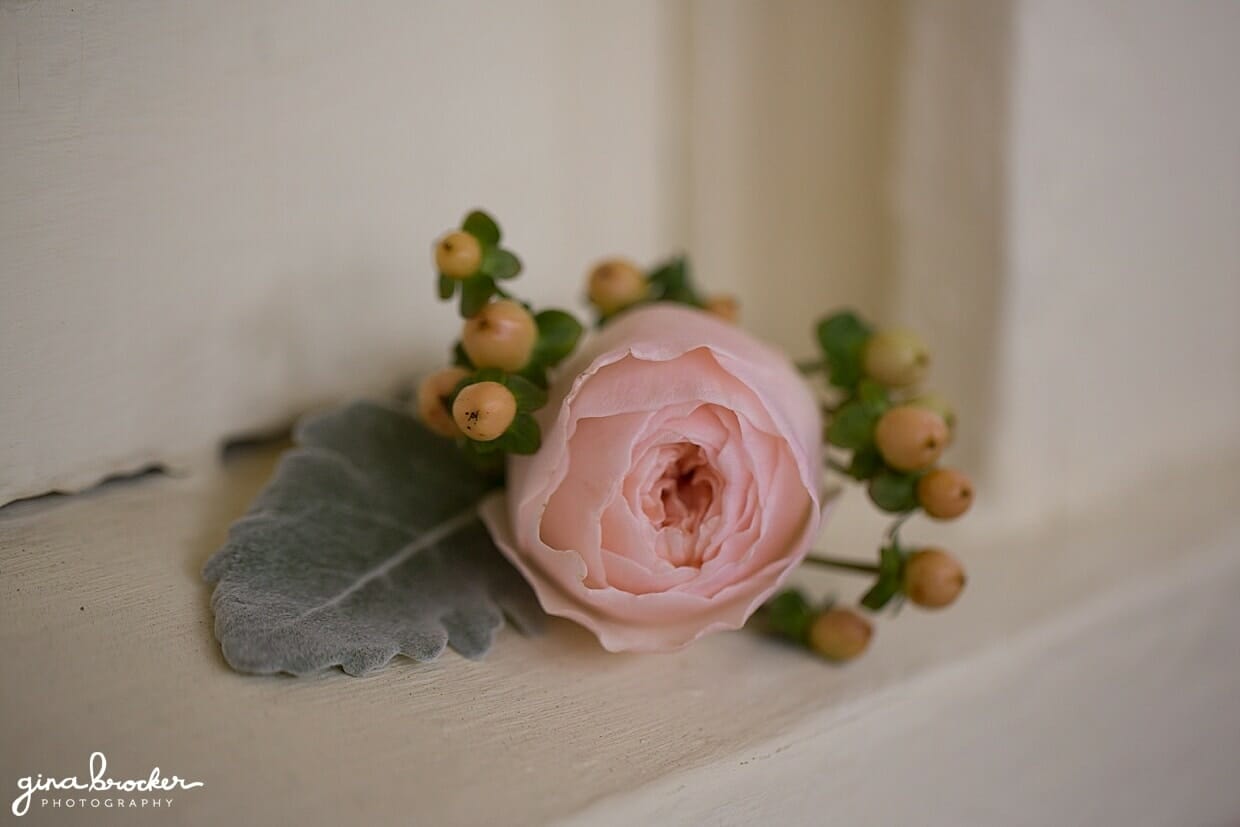 A beautiful pink boutonnière created by Kristen at Garden Designs