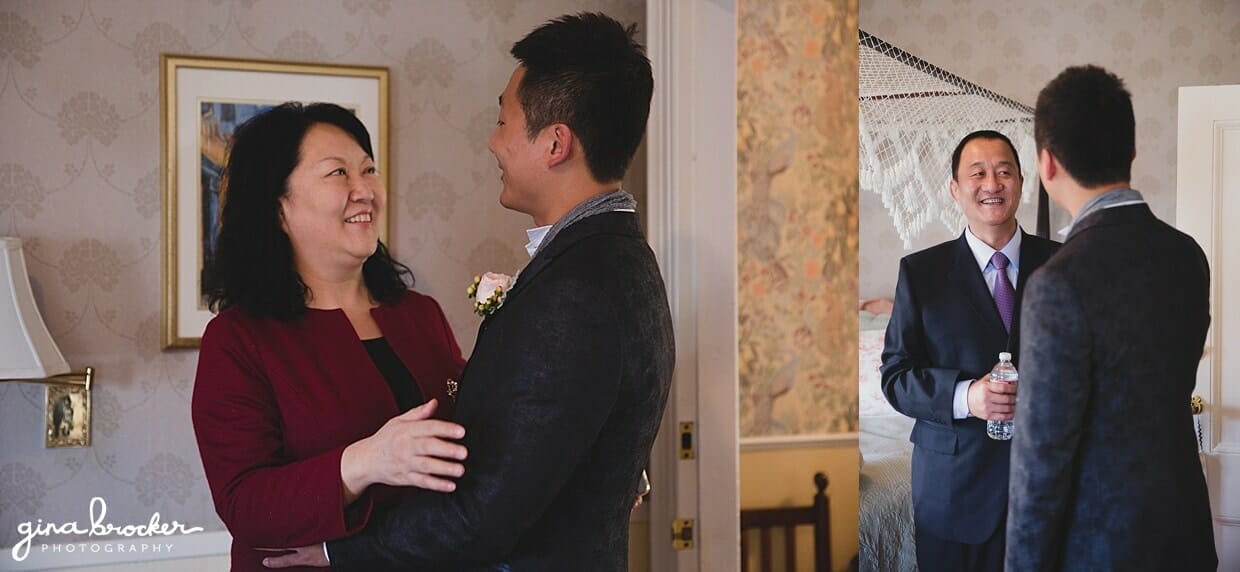 The groom shares a special moment with his mother and father while getting ready for his hammond castle wedding