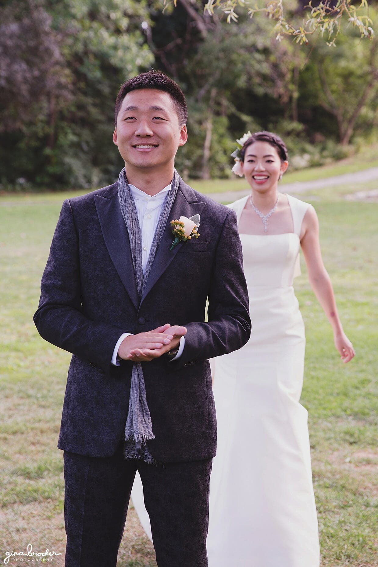 A very sweet first look in Mill Pond Park, Rockport, Massachusetts during a hammond castle wedding