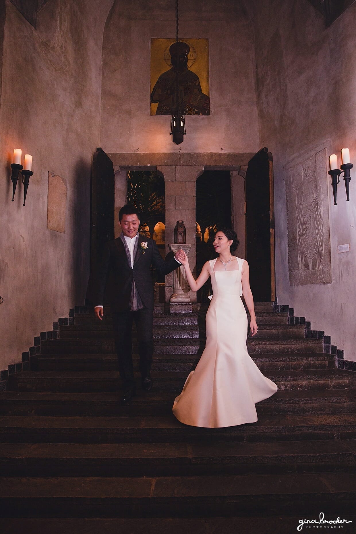The bride and groom make their grand entrance during their Hammond Castle Wedding