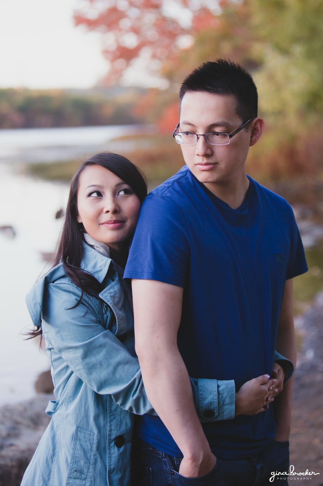 A sweet portrait of a couple along the charles river during their fall engagement session in boston