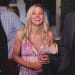 A candid photograph of a lady laughing during a rehearsal dinner in Nantucket