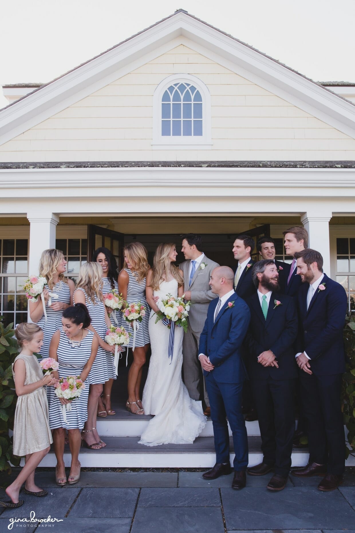 A casual portrait of the nautical inspired wedding party during their Westmoor Club wedding in Nantucket, Massachusetts