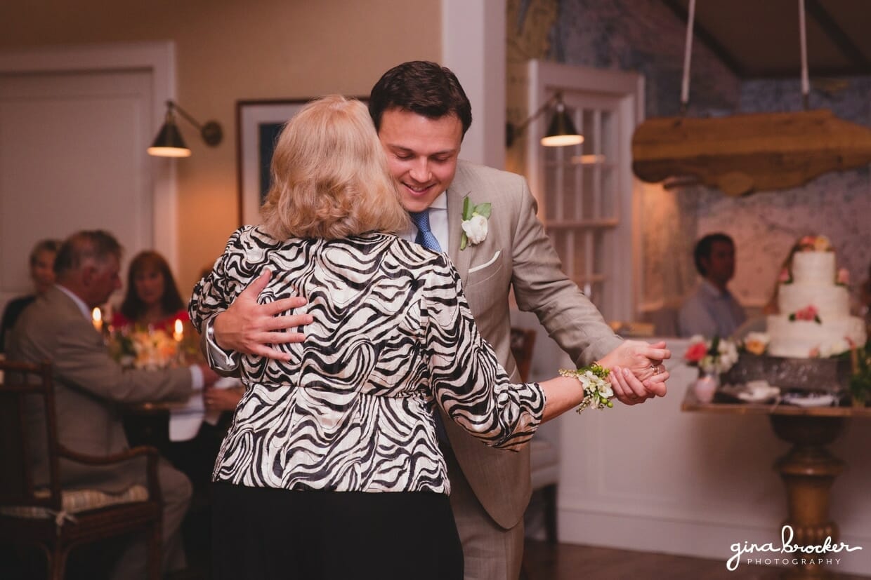 A sweet photograph of a mother and son dance during a Nantucket Wedding at the Westmoor Club