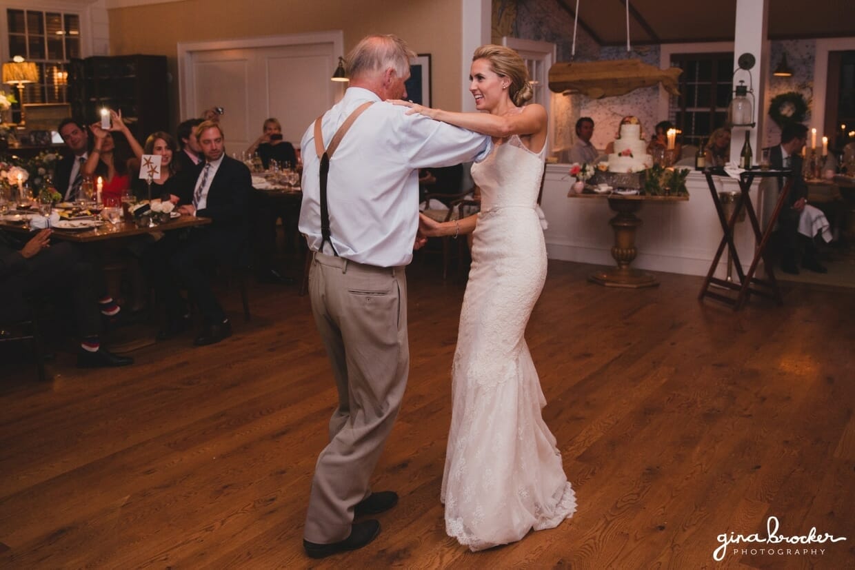 A fun photograph of a bride dancing the two-step with her step father during her Nantucket Wedding at the Westmoor Club