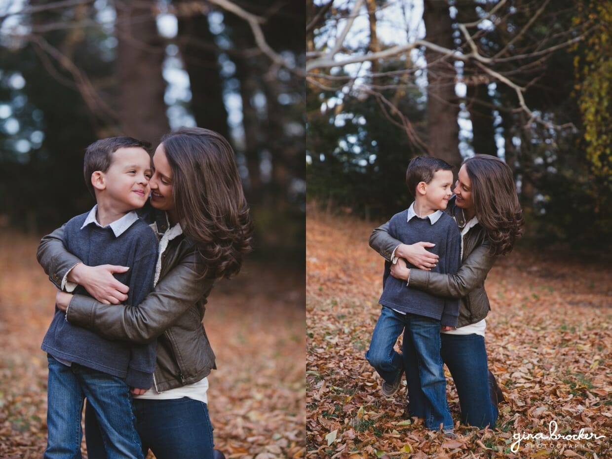 A very sweet photograph of a mother hugging her son during their fall family photo session in Boston's Arnold Arboretum
