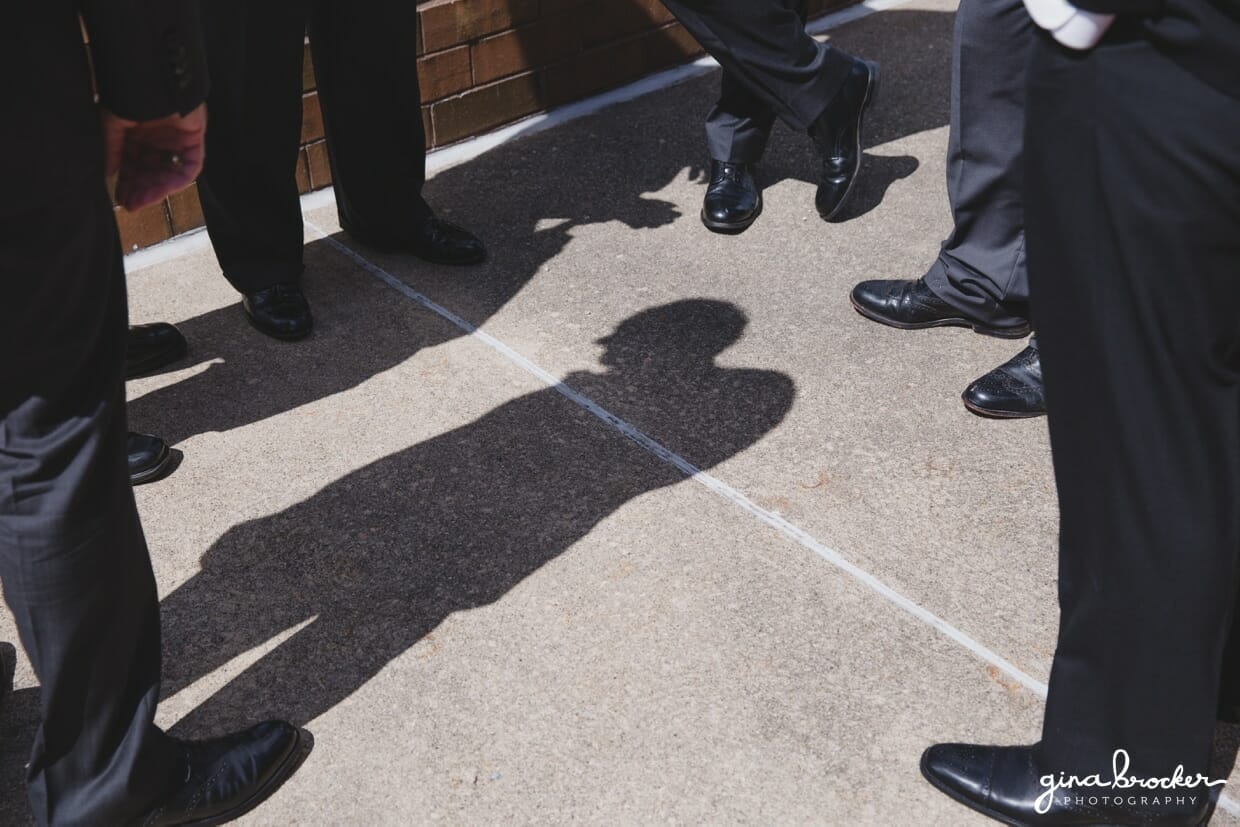 An artistic and unusual photograph of Groom and Groomsmen before their classic and elegant wedding in Boston, Massachusetts