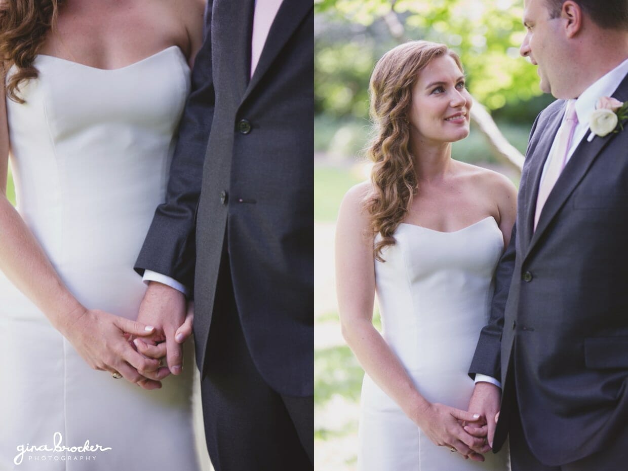 A sweet and romantic portrait of a bride and groom holding hands during the first look at their elegant and classic Boston Wedding in Massachusetts