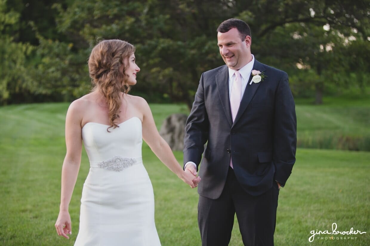 A cute sunset portrait of a bride and groom during their elegant and classic wedding in Boston, Massachusetts