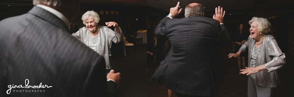 Grandparents dance and laugh at a classic and elegant wedding reception in Boston, Massachusetts