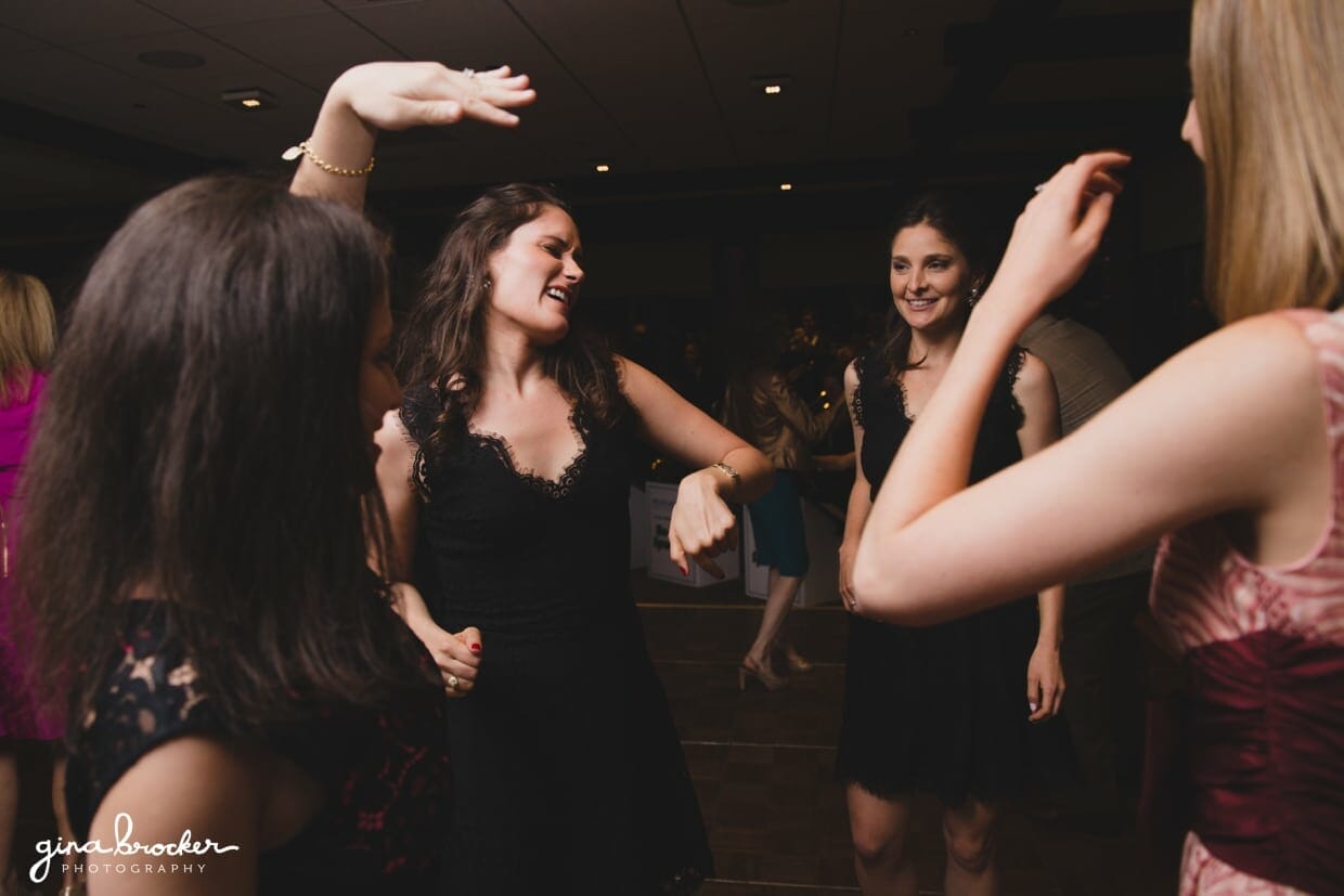 Bridesmaids dancing at a classic and elegant wedding reception in Boston, Massachusetts