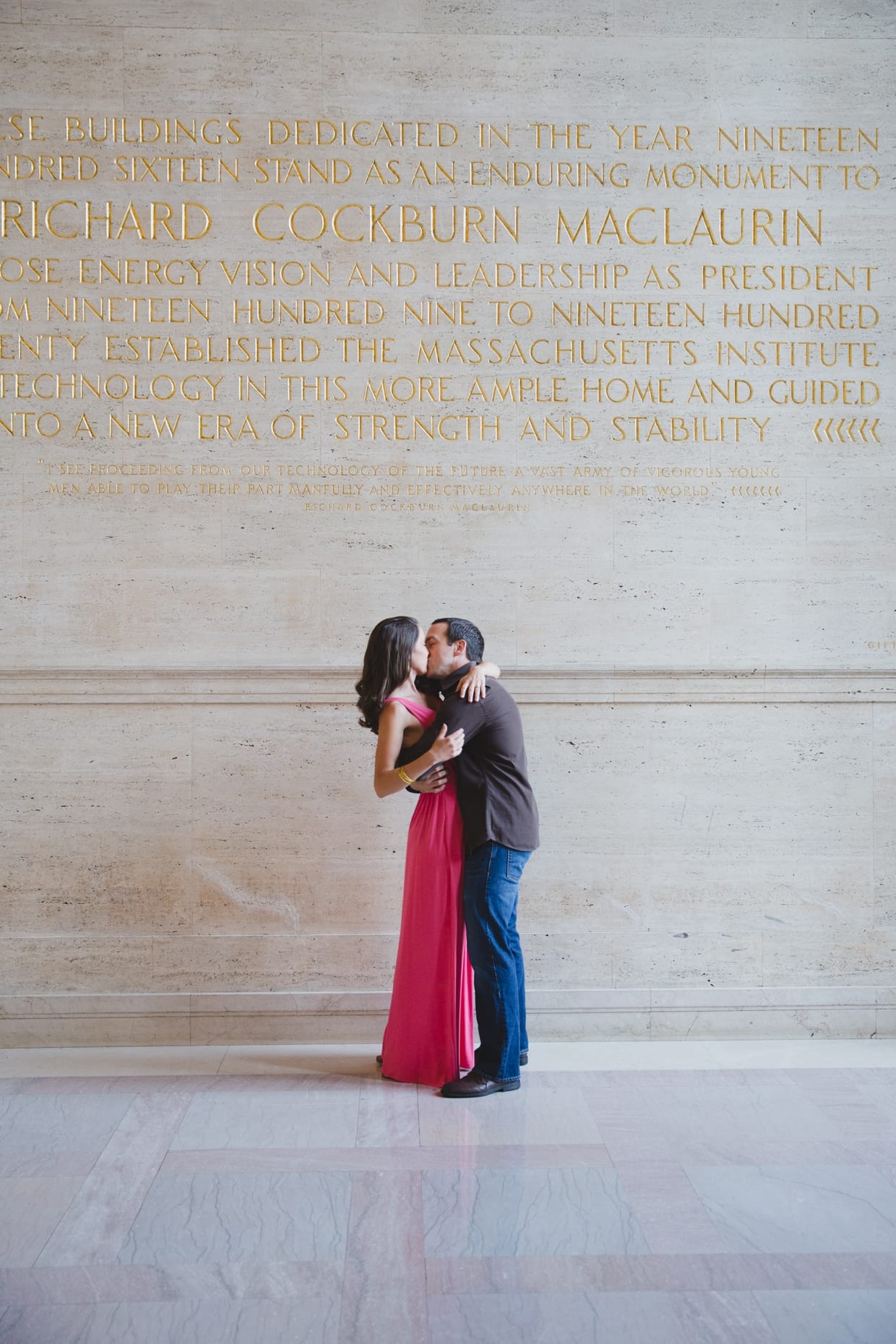 Romantic photograph of a couple kissing and hugging during their couple session at the Massachusetts Institute of Technology.