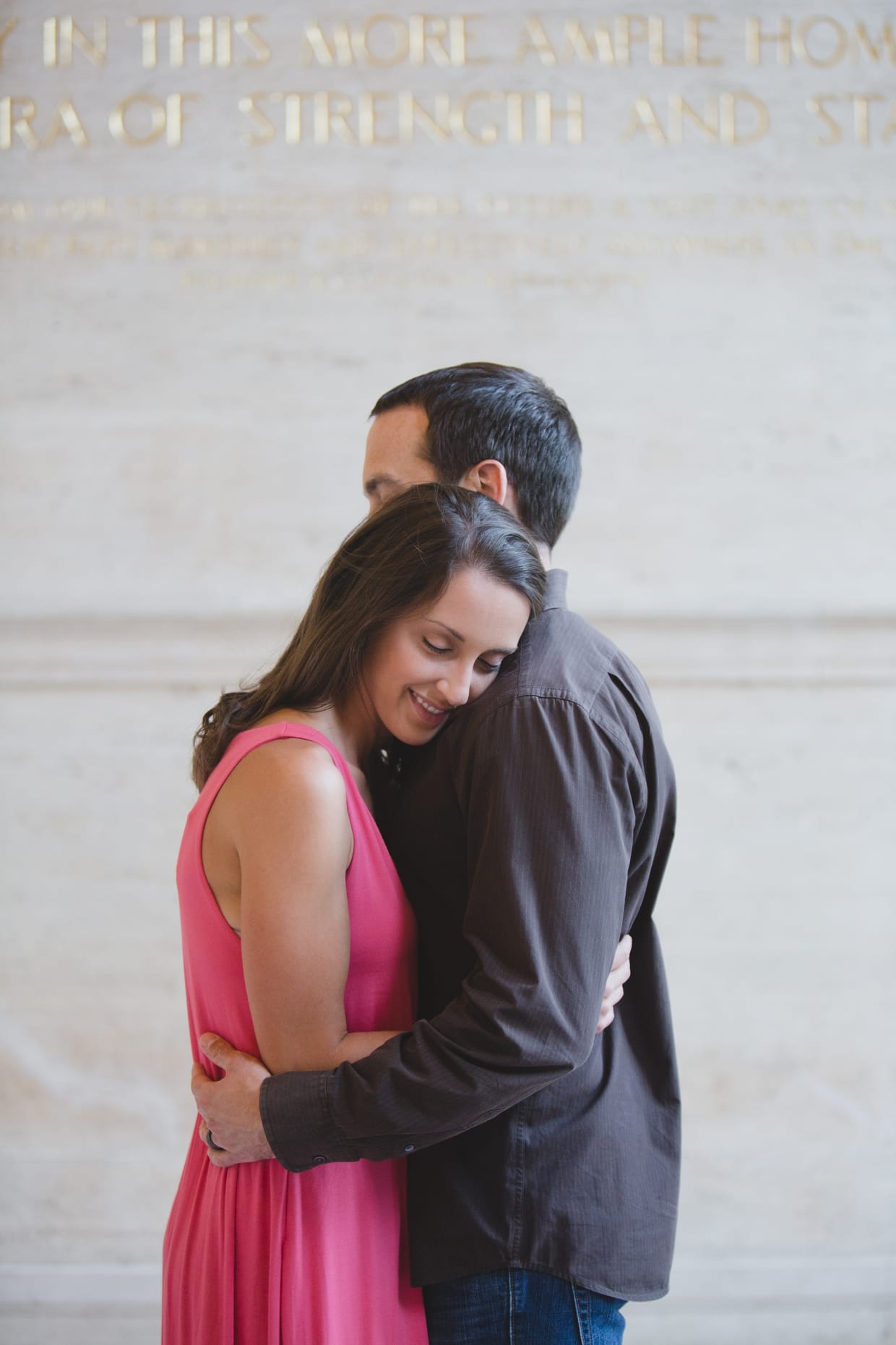 A sweet photograph of a couple hugging during their couple session at the Massachusetts Institute of Technology in Cambridge.