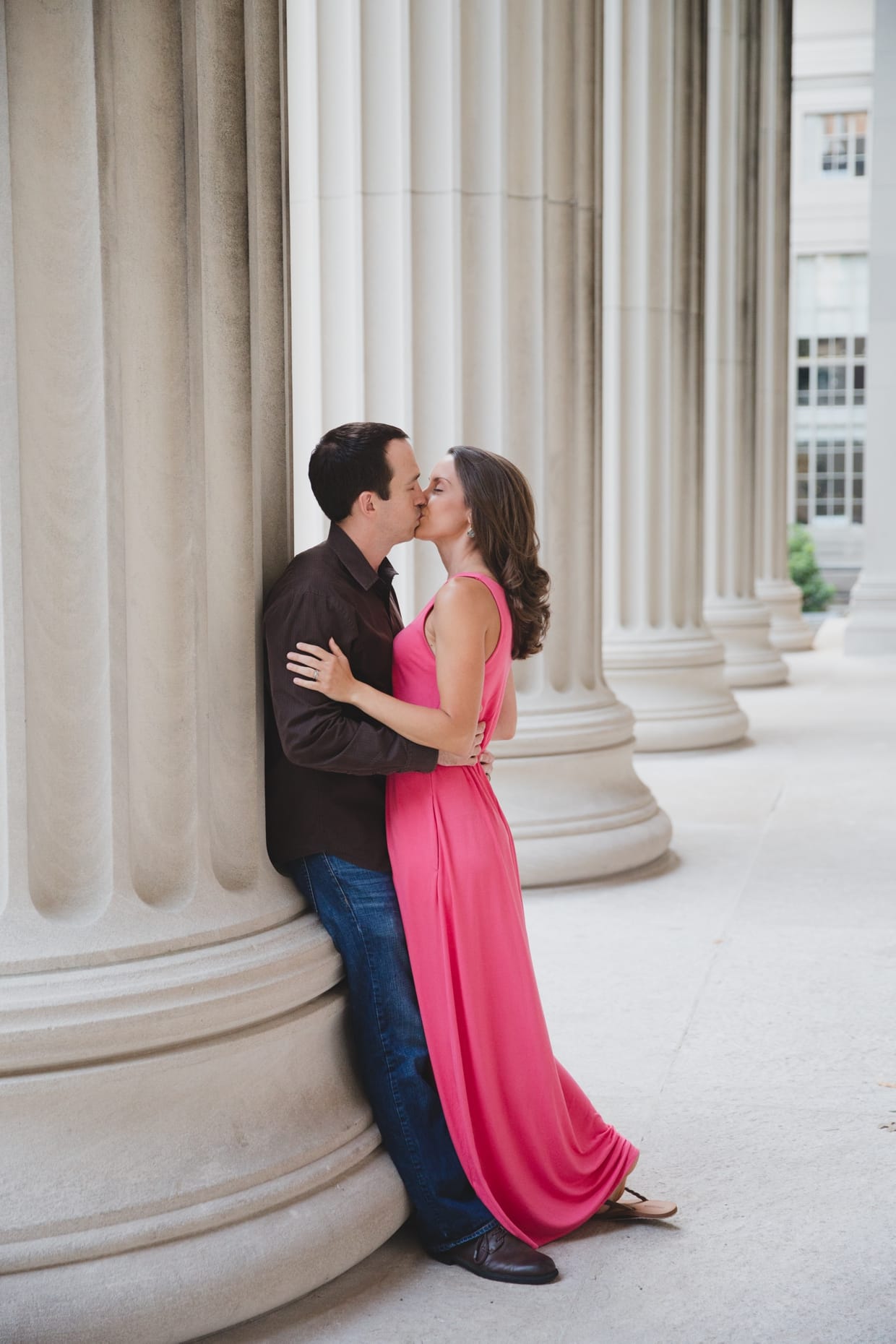 A romantic photograph of couple kissing at the Massachusetts Institute of Technology during their couple session in Cambridge.